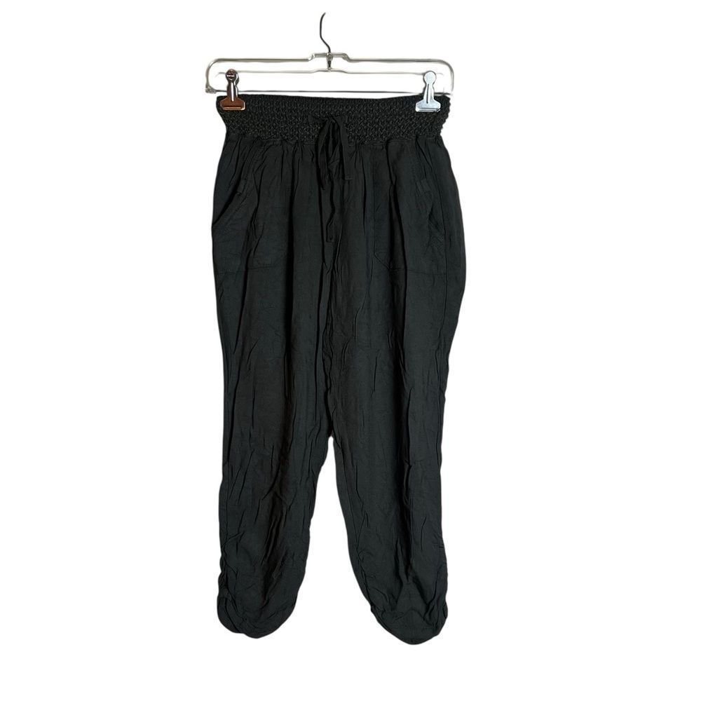 Rewash dark green pull on pants. Size small